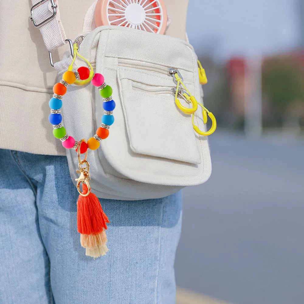 Kivoct-pulsera con cuentas de silicona para hombre y mujer, brazalete con borlas, llavero para teléfono, mochila de coche, colgante, regalo de joyería, 1 unidad, nuevo - imagen 5