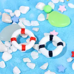 Accesorios casa de muñecas: paisaje marino con barco y silla de playa