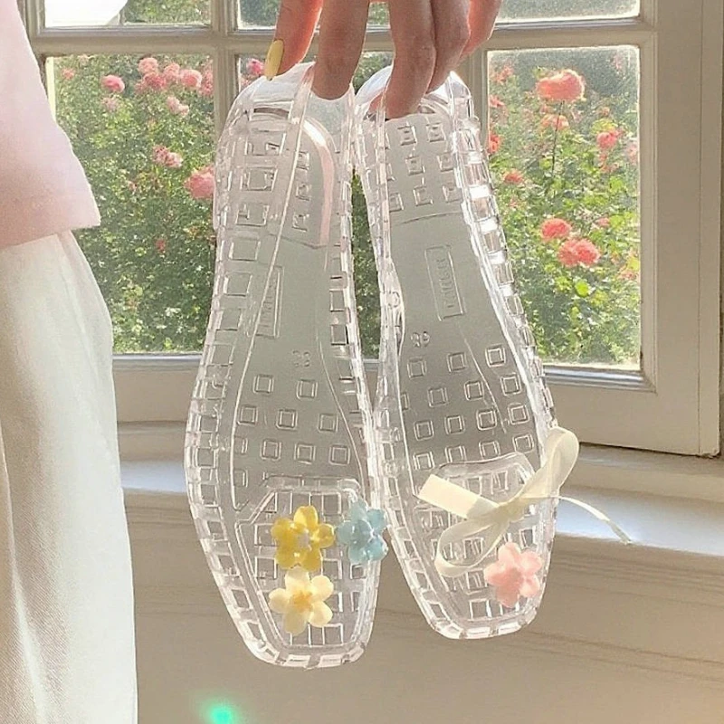 Sandalias de moda de estilo coreano para mujer, zapatos planos de gelatina de verano, PVC suave, cinta de flores DIY, zapatos planos de calle de playa diarios para mujer - imagen 2