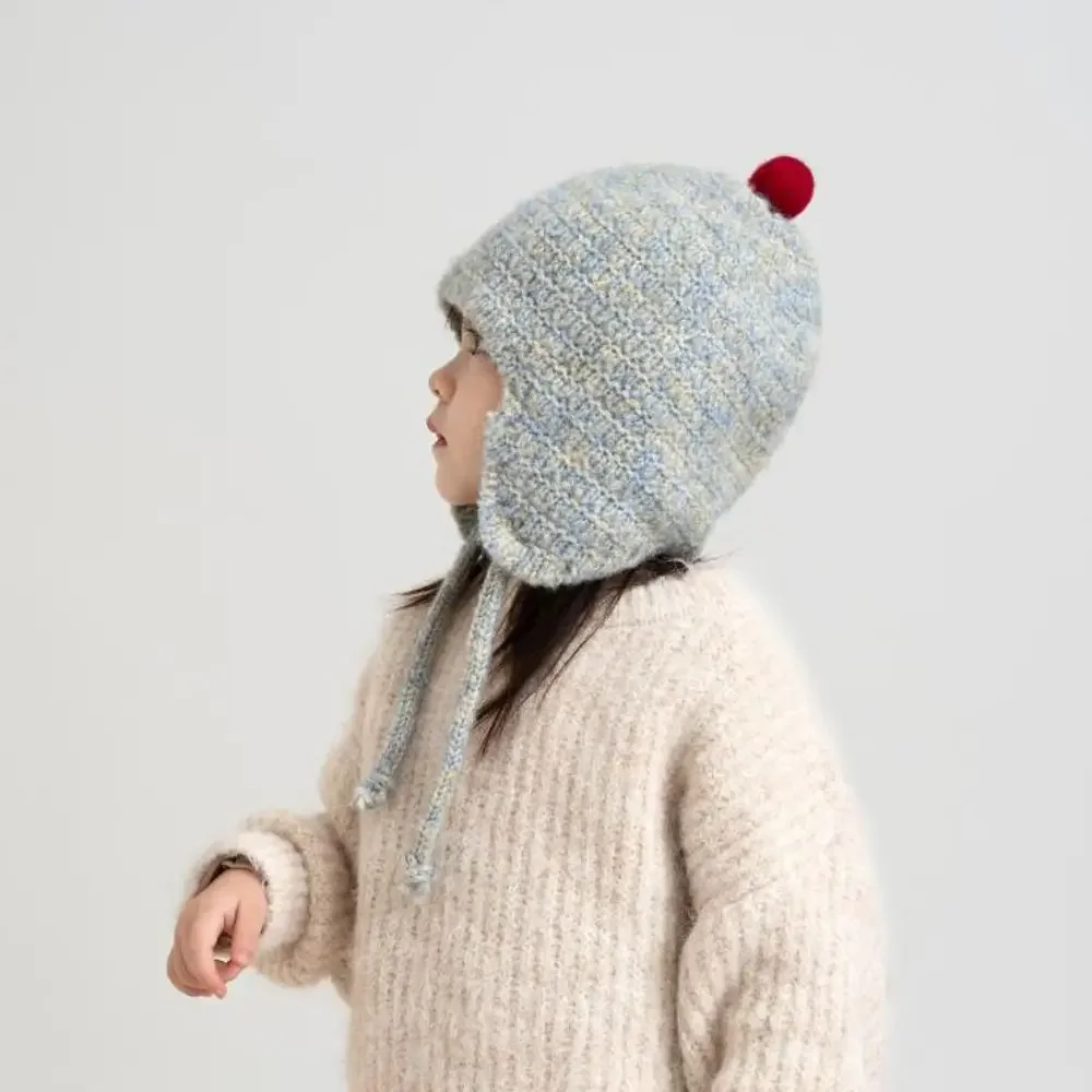 Gorro tejido a la moda para niños pequeños, protección para los oídos, gorros a prueba de viento para niños, gorro con orejeras de ocio para mantener el calor para niño y niña - imagen 4