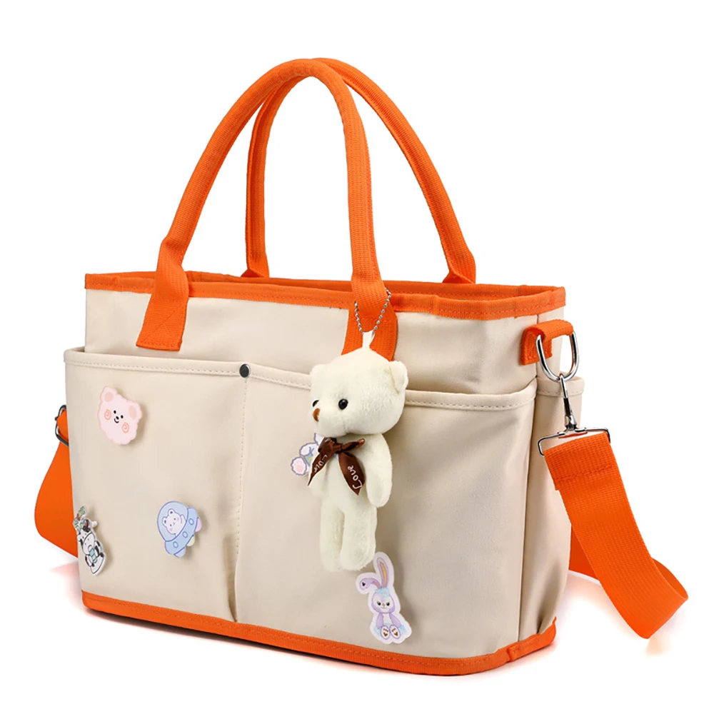Bolsa de pañales Linda de lona ligera con bolsillo lateral - imagen 3