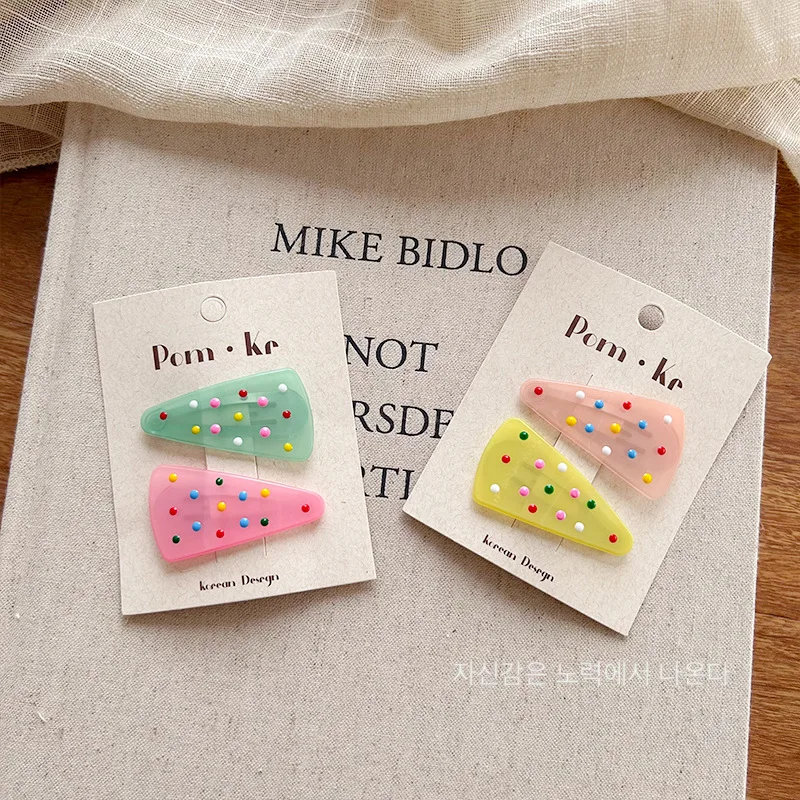 Pinzas triangulares de gelatina pastel con lunares para niños - imagen 5