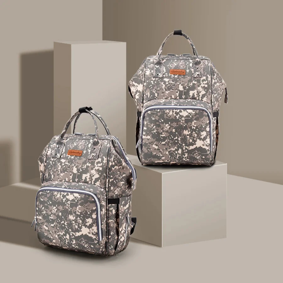 Bolso maternal grande con porta-bebé y compartimento para pañales