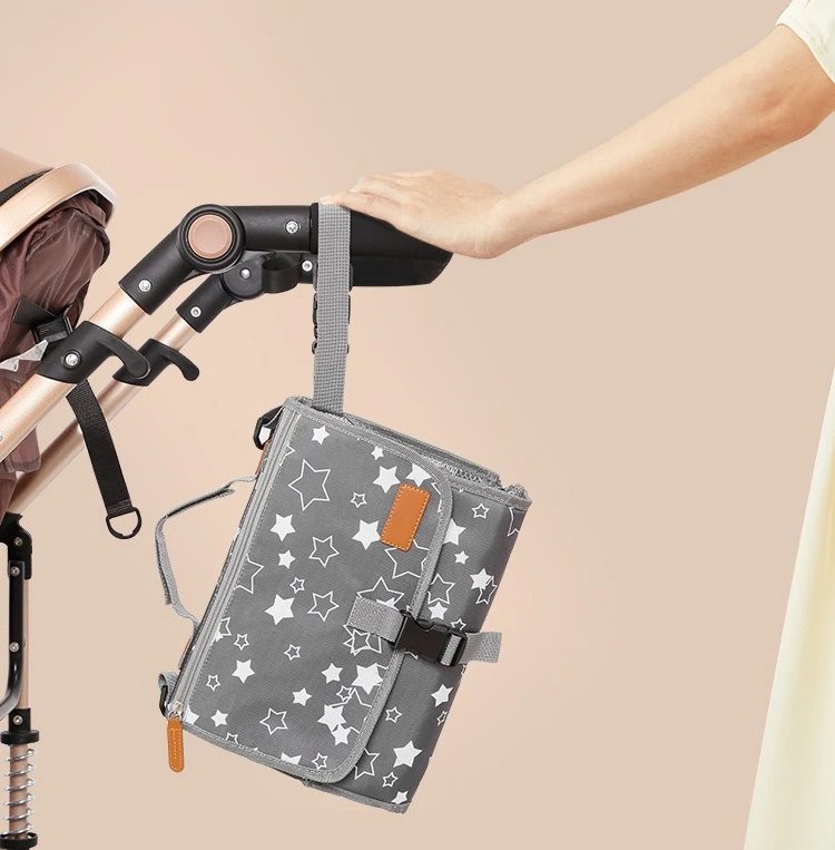 Bolsa organisadora con compartimentos para pañales y accesorios