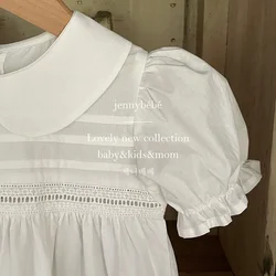 Pelele recién nacido niña con cuello de pétalo y manga corta