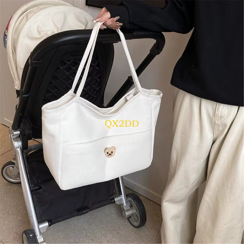Bolsa pañales algodón con bordado de oso y bolsillos impermeables - imagen 3