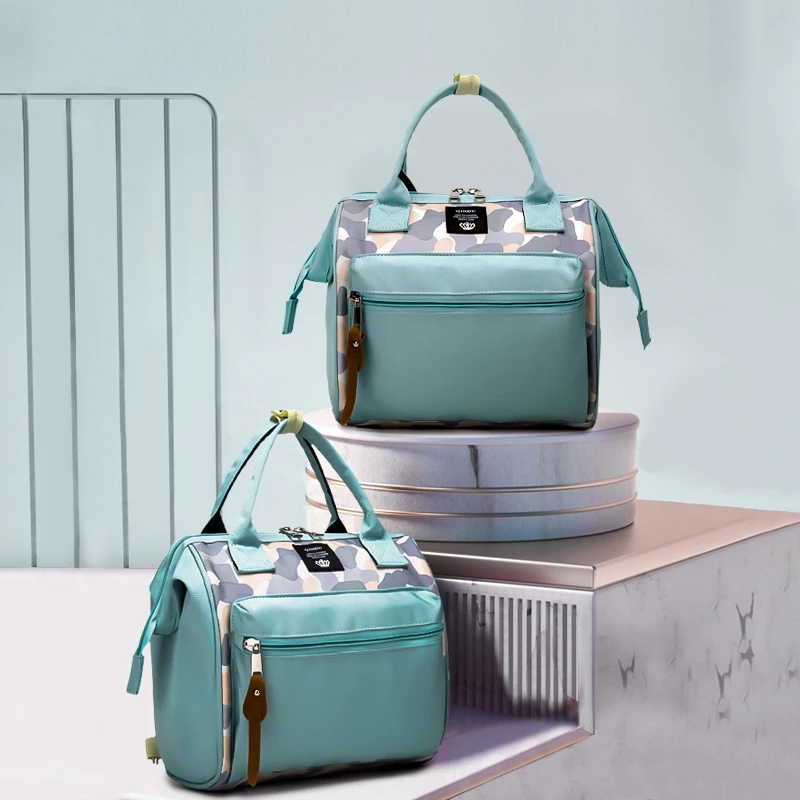 Bolsa de pañales con correas para cambiador, bolsa de maternidad para el cuidado del bebé, mochila antiincrustante impermeable para viaje, bolsa para cochecito, bolsa para pañales - imagen 2