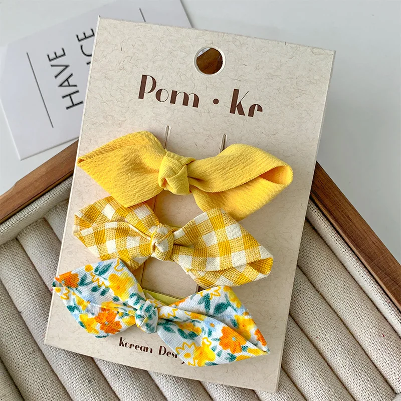 Pinzas y lazos para el pelo de niña – Estampado floral y a cuadros - imagen 4