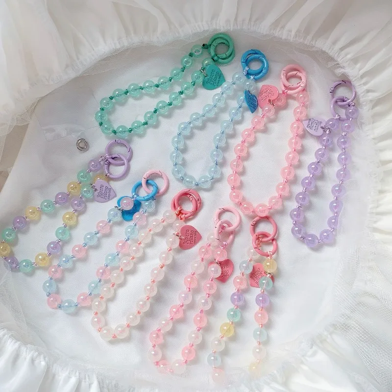 Sujetachupete cordón transparente con correa muñeca y corazón - imagen 3