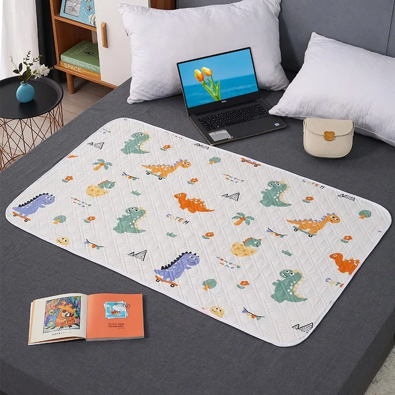Protector de cama impermeable lavable con dinosaurios para bebé - imagen 3