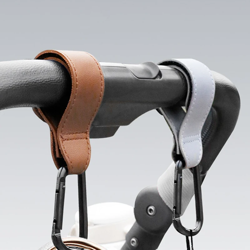 Gancho para cochecito de bebé, gancho ajustable de cuero PU para cochecito, organizador de carrito, colgador de bolsa de pañales, accesorios de viaje para niños y niñas, 1 Uds.