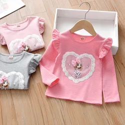 Camisa bordada para niña con volantes y manga larga