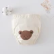 Caring brown bear