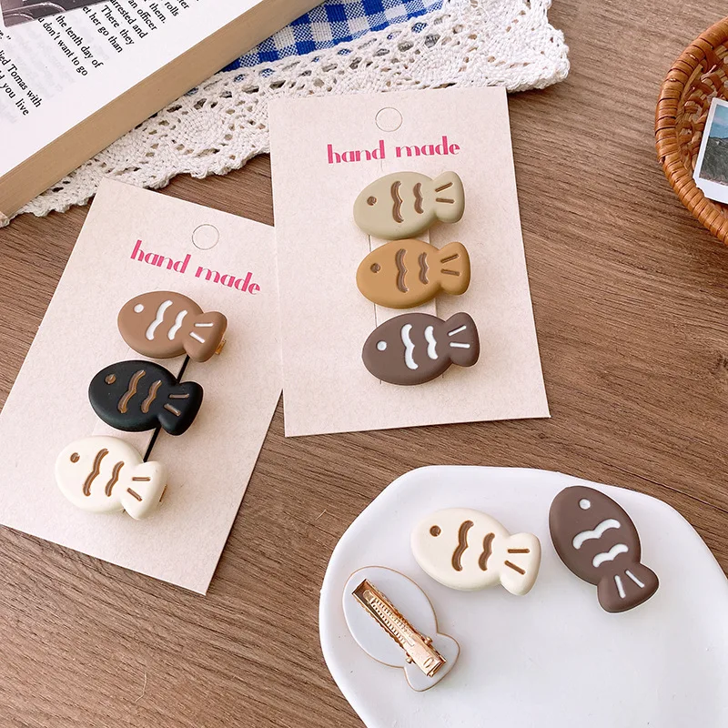 Pinzas pelo niños forma pez taiyaki – Diseño coreano beige con dibujos animados