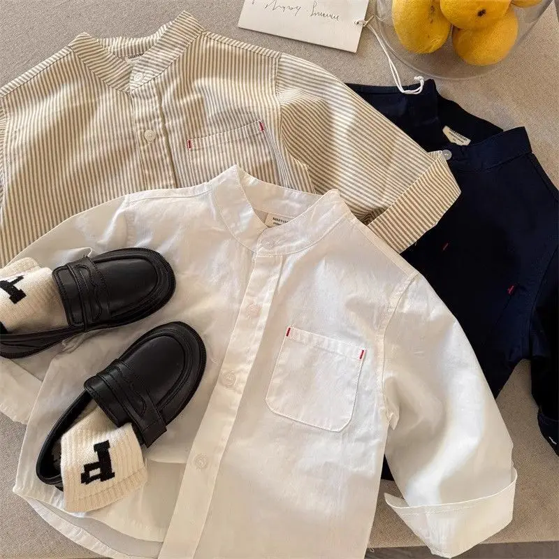 Camisa a rayas de estilo coreano para niños, camisa con bolsillo de Color sólido para niños y niñas, Top versátil de moda para bebés, otoño