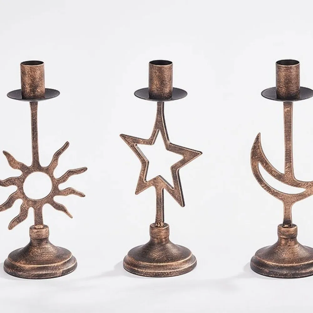 Candelabro vintage de hierro con luna y estrellas para velas