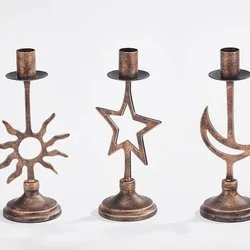 Candelabro vintage de hierro con luna y estrellas para velas