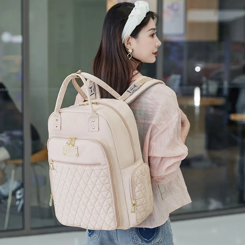 Bolsa de pañales impermeable con cambiador amplio y organizada - imagen 3