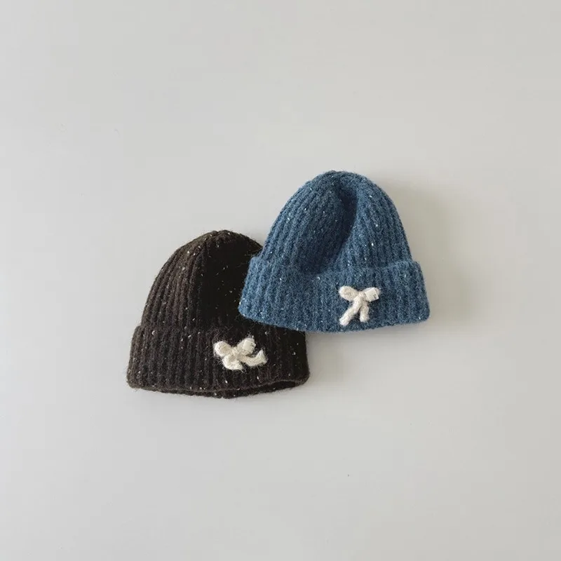 Gorro de punto con lazo para bebé de estilo coreano, bonito gorro de invierno para niñas, gorro de ganchillo suave y cálido, gorro de moda para niños pequeños con orejeras - imagen 2