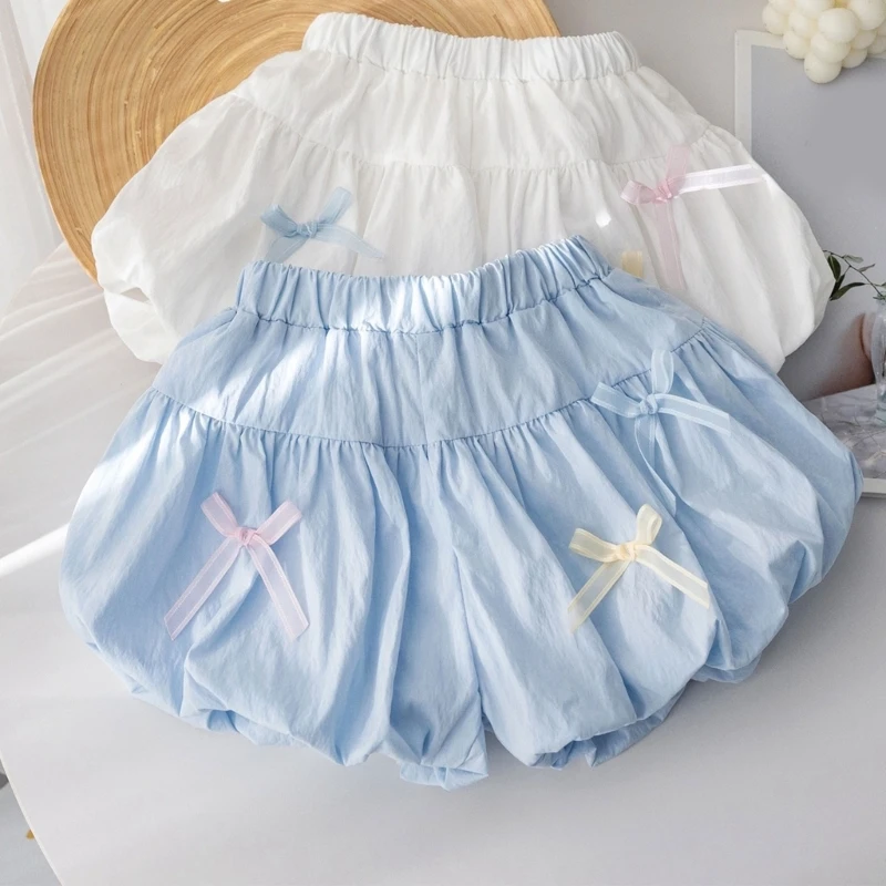 Ropa de verano de Color sólido para niñas, pantalones cortos decorativos con lazo, versión coreana, ropa informal doblada para niños, falda de 3 a 7 años