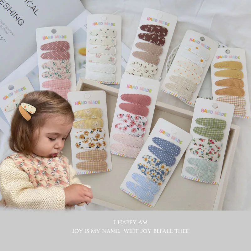 Pinzas de tela con flores para el pelo de bebés y niños