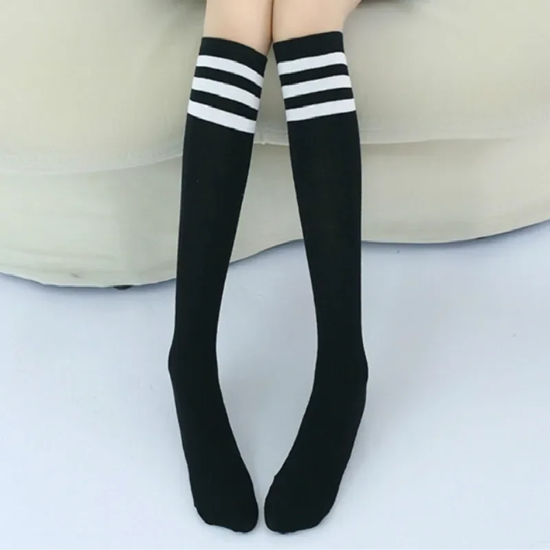 Calcetines deportivos hasta rodilla algodón rayado blanco y negro niño - imagen 3