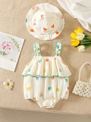 Mono tirantes niña de verano con estampado corazón y sombrero