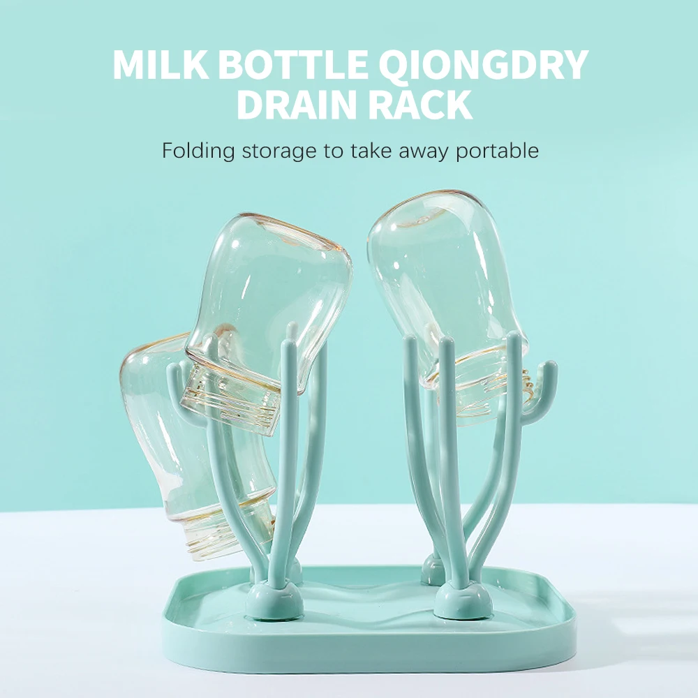 Una rejilla para escurrir qiongdry para botellas de leche. Es un estante de almacenamiento plegable diseñado para sostener botellas de leche boca abajo para escurrirlas y secarlas. El estante es portátil y se puede plegar fácilmente cuando no esté en uso.