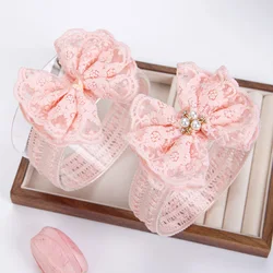 Diadema de encaje con perlas y lazo para bebe