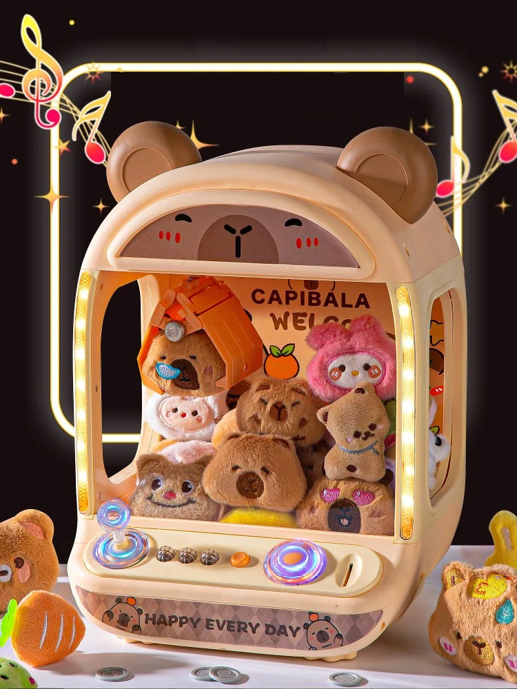 Niños jugando con la máquina de garra
