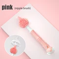 Pink pacifier brush
