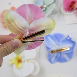Pinzas de pelo con orquídeas artificiales para niña