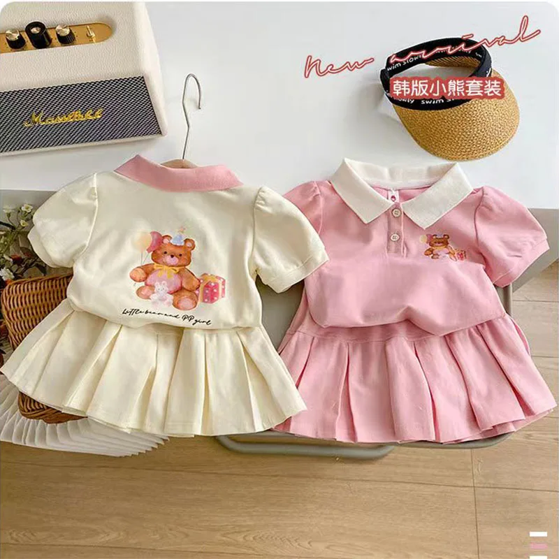 Conjunto niña verano top manga corta con solapa y falda ligera