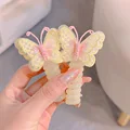 2 yellow butterflies