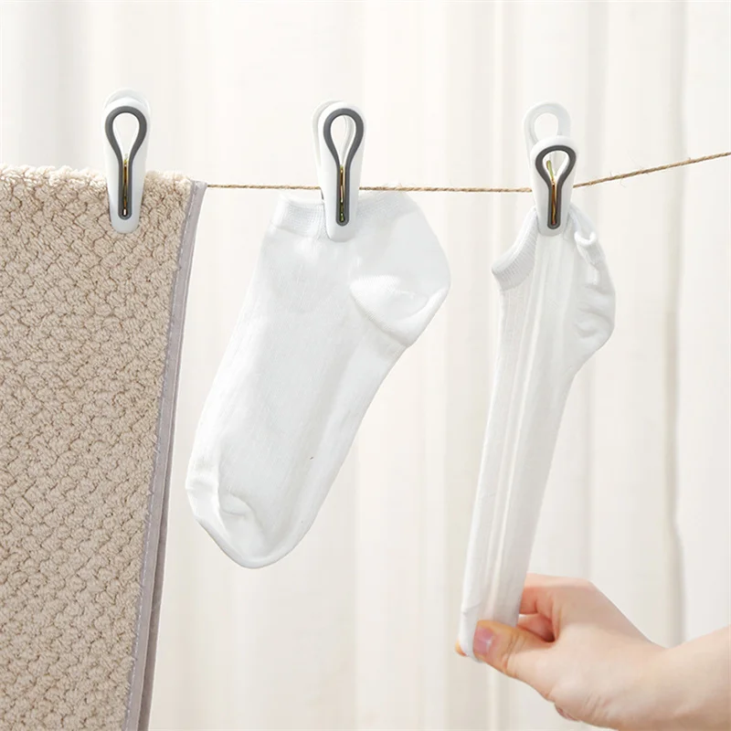 Nuevo 1 Juego de pinzas para secar ropa, Clip para sábanas de dormitorio, ropa de cama para el hogar, Clip fijo fuerte a prueba de viento para ropa y calcetines - imagen 4