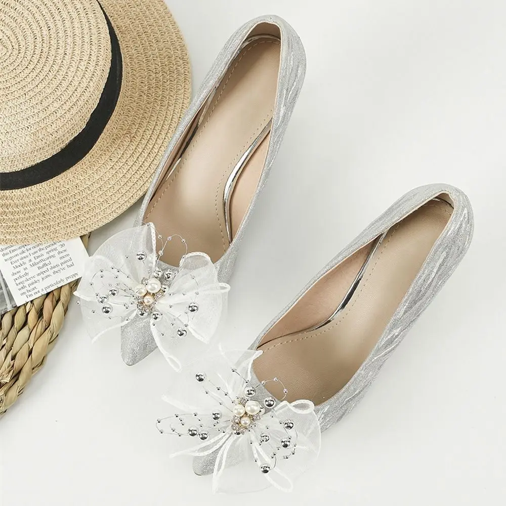 Zapitos de niña con perlas y lazo – Acabado brillante