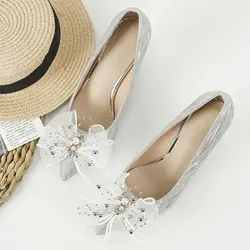 Zapitos de niña con perlas y lazo – Acabado brillante
