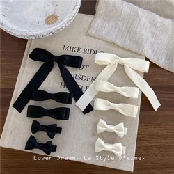 2 unids/set elegante Simple cinta de satén lazo doble pinzas para el cabello para niños niñas tela cubierta lateral flequillo Clips a presión conjunto de pasadores