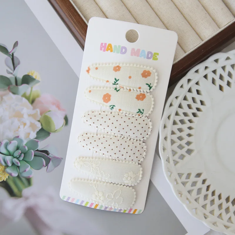 Pinzas de tela con flores para el pelo de bebés y niños - imagen 2