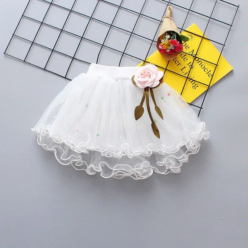 Falda de bebé con volantes de Color sólido, Falda corta de sabor extranjero para niños, colgante de flores, falda de estilo dulce y bonito de malla de verano para niñas - imagen 3