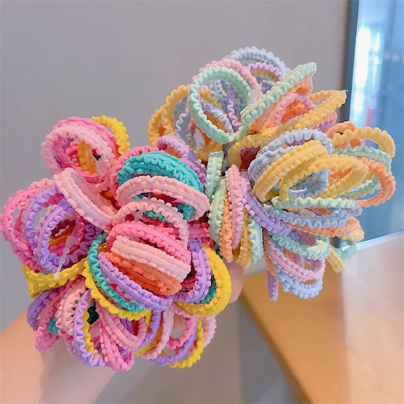 50 Uds. Versión coreana de banda para el cabello de Color caramelo, banda de goma pequeña de encaje de Color para niños, diadema con lazo para bebé, tocado bonito para niña