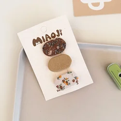 Pinzas florales de felpa para el pelo de niños