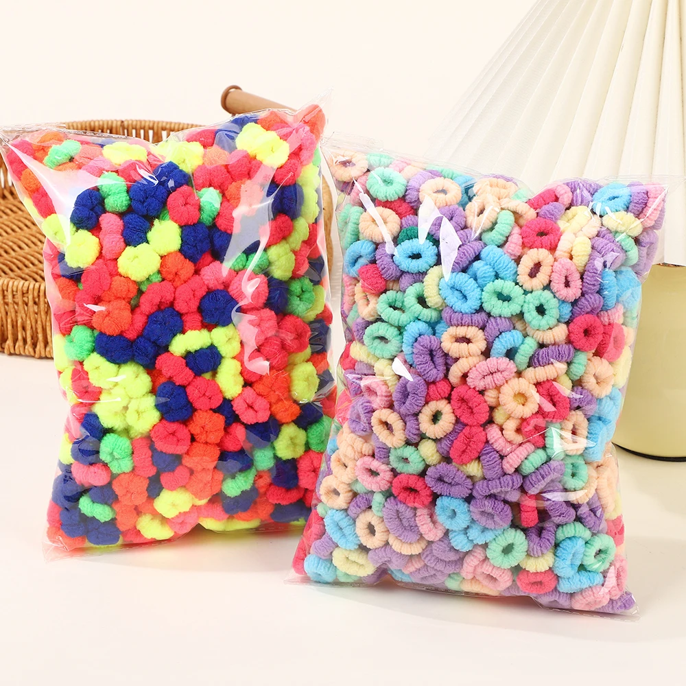 Lazos y gomas de pelo con flores para niña - Colores variados