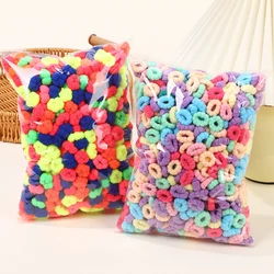 Lazos y gomas de pelo con flores para niña - Colores variados