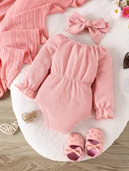 Body manga larga rosa con lazo para bebé