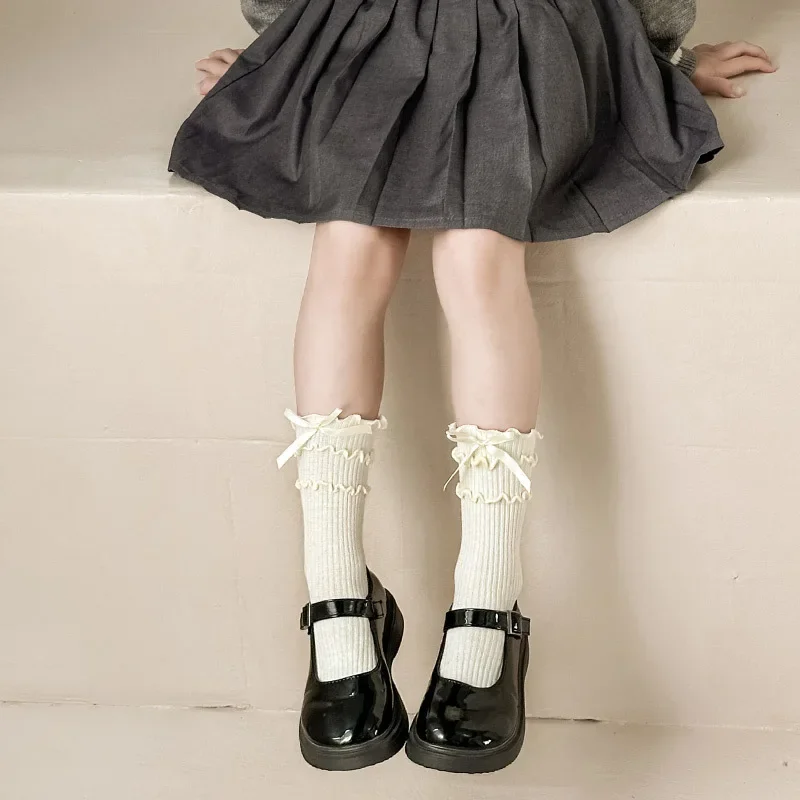 2 par/set de calcetines de algodón blanco crema estilo Lolita para niñas, calcetines de princesa con volantes de Triple capa y lazo coreano para niños pequeños y niños - imagen 5