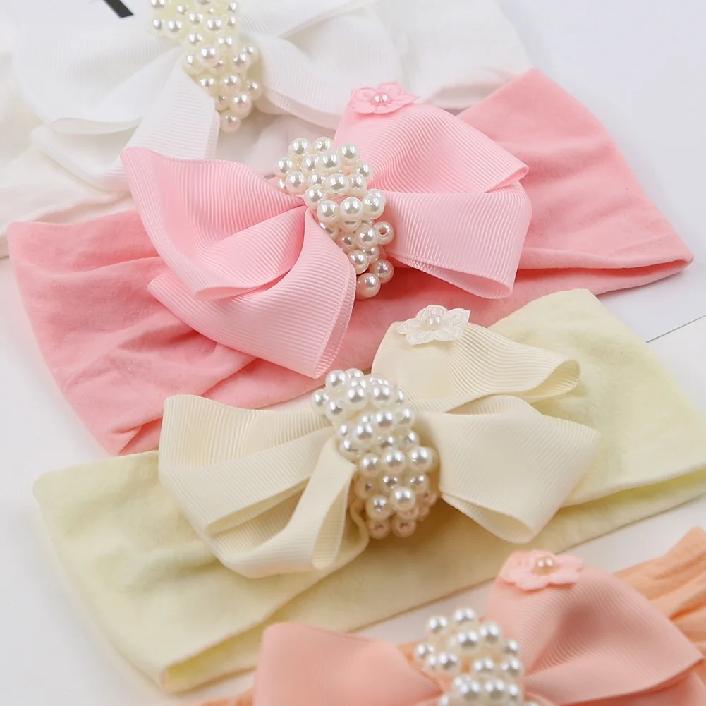 Diadema de nailon liso con lazo y perlas para bebé recién nacido - imagen 5