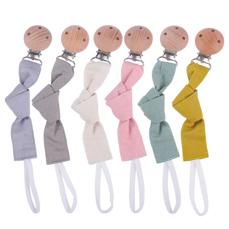 Clip de madera natural para chupete seguro y mordible infantil