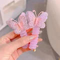 2 purple butterflies