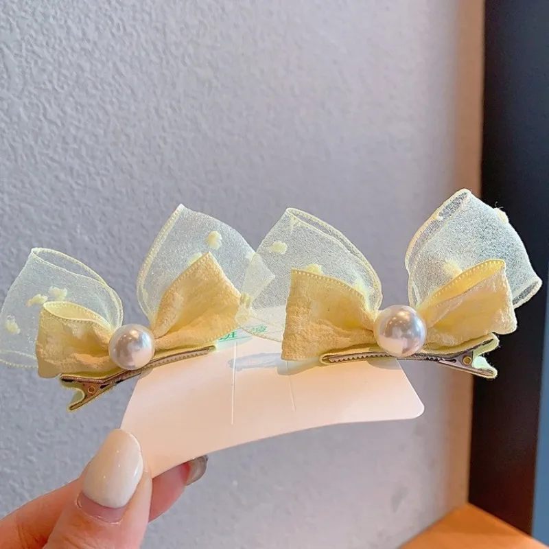 Pinzas con lazo de perlas y orejas de conejo para niñas - imagen 5